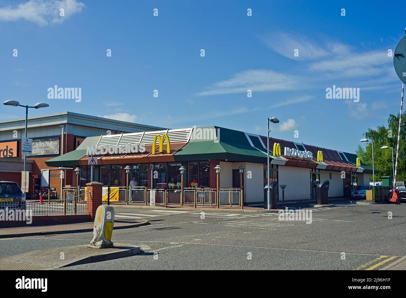 McDonald`s outlet and drive through on Queen street shopping park. Stock Photo